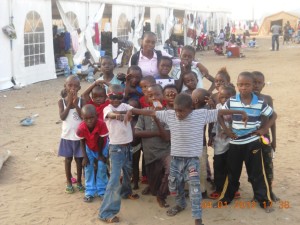 Huguette encouraging refugees after explosion disaster in Brazzaville