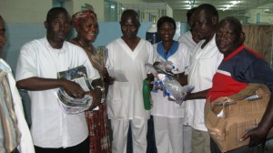 Thierry distributing hygiene products as well as Gospel tracts and magazines to hospital staff