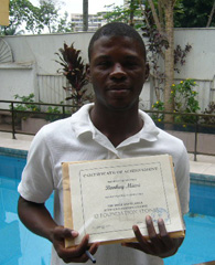 19_Bonhey with his Bible Course certificate back in 2008