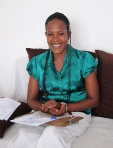 9_Marie Nyota signing up to become a recipient of our micro-enterprise project
