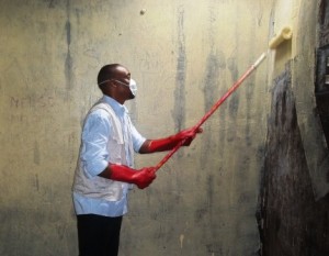 5_Olivier repainting bathrooms at central prison
