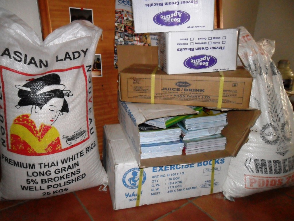 Donated food items and notebooks