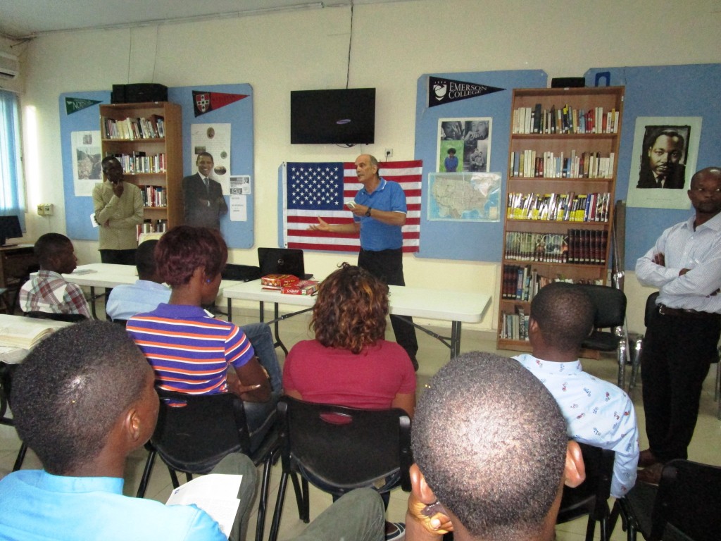 Gino and Cedric presenting documentary to university students at American Corner.
