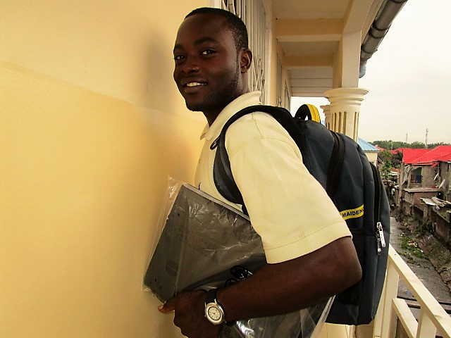 Jacques, so happy with his new laptop and backpack